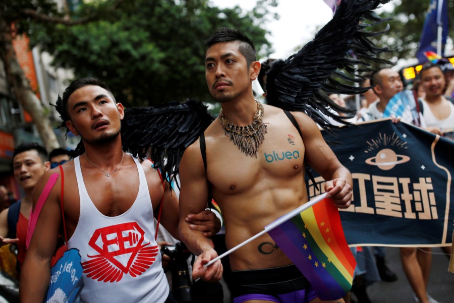 A participant holds a rainbow flag as he takes part in the lesbian, gay, bisexual and transgender pride parade in Taipei, Taiwan on Oct. 29. A participant holds a rainbow flag as he takes part in the lesbian, gay, bisexual and transgender pride parade in Taipei, Taiwan on Oct. 29.